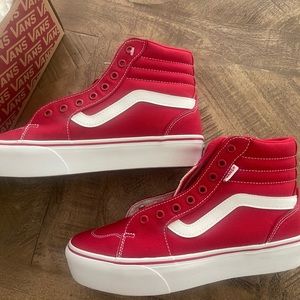 VANS high top platform tango red . Never worn.
